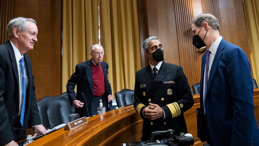 PHOTO: In this Feb. 8, 2022, file photo, from right, Chairman Ron Wyden, Surgeon General Vivek H. Murthy, Sen. Chuck Grassley, and Ranking member Sen. Mike Crapo, talk before the Senate Finance Committee hearing titled Protecting Youth Mental Health.