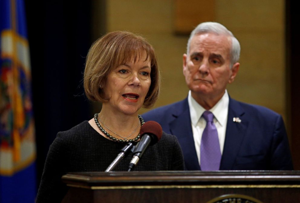 PHOTO: Minnesota Lieutenant Governor Tina Smith answers a question, Dec. 13, 2017,  after Minnesota Governor Mark Dayton, right, announced that Smith will replace U.S. Senator Al Franken.