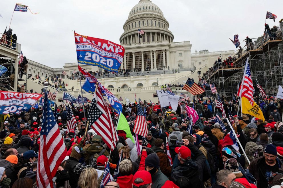 PHOTO: Demonstrators attempt to enter the U.S. Capitol building during a protest of Joe Biden's victory in the Electoral College for the Presidency in Washington, Jan. 6, 2021.