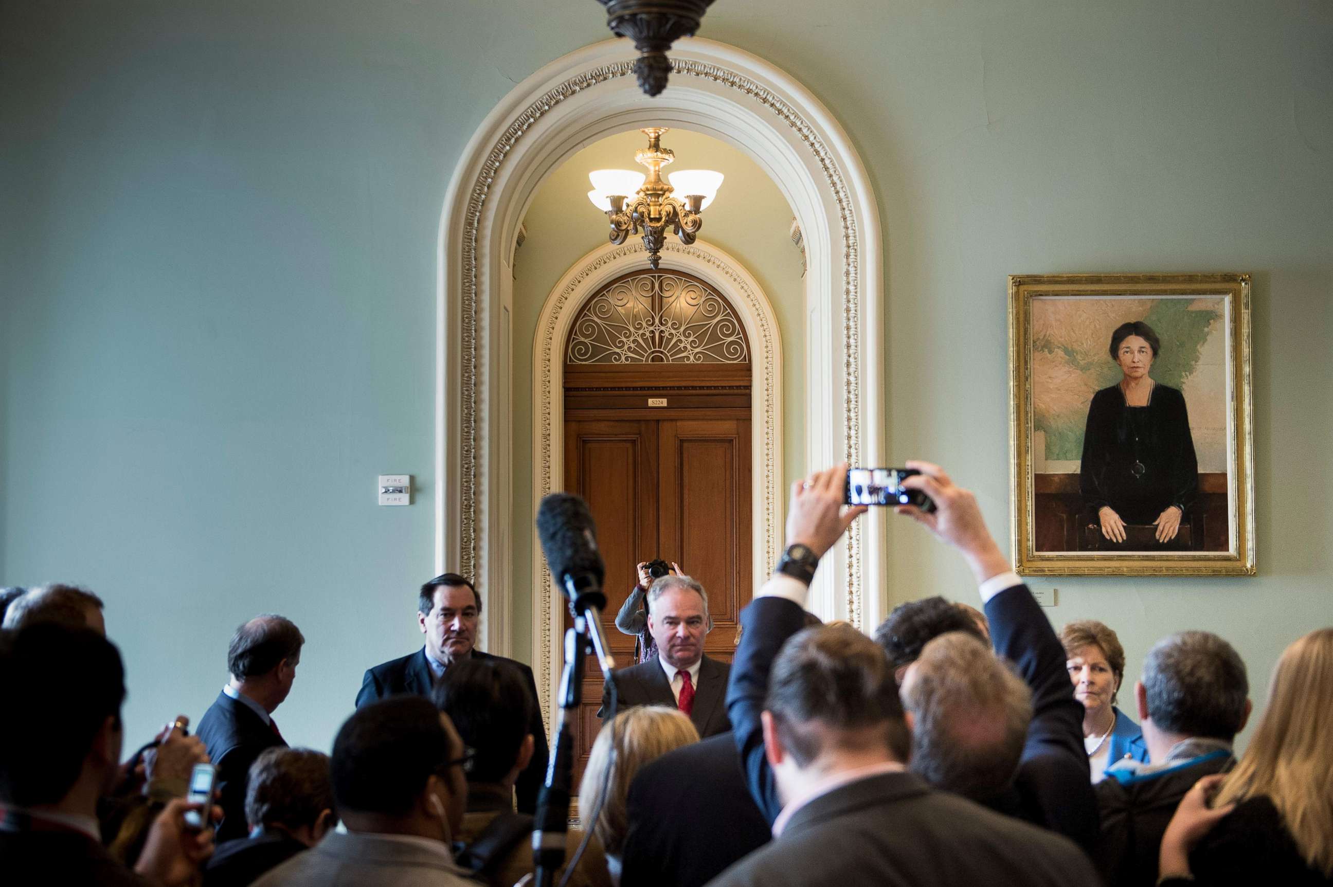 PHOTO: Senator Tim Kaine waits to speak to a reporter on Capitol Hill after the Senate voted to fund the US government, Jan. 22, 2018 in Washington.