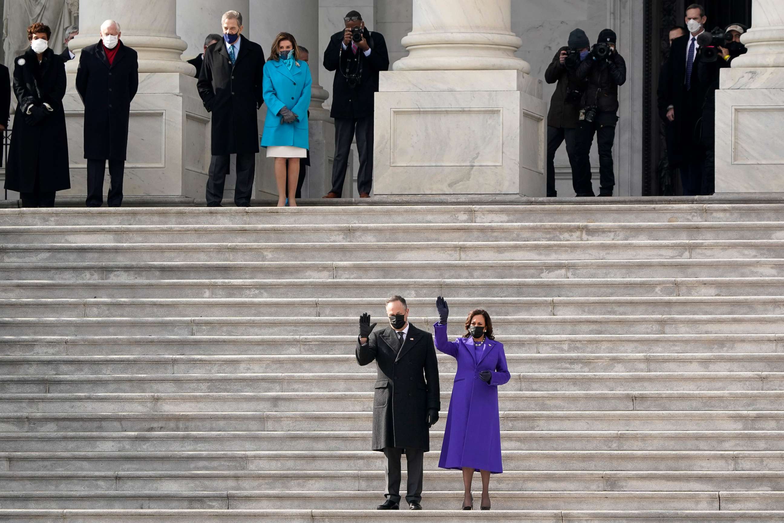 PHOTO: Vice President Kamala Harris and her husband Doug Emhoff wave as former Vice President Mike Pence and his wife Karen Pence depart the Capitol after the Inauguration of President Joe Biden at the U.S. Capitol in Washington, D.C., Jan. 20, 2021.