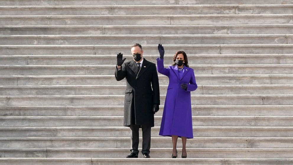 PHOTO: Vice President Kamala Harris and her husband Doug Emhoff wave as former Vice President Mike Pence and his wife Karen Pence depart the Capitol after the Inauguration of President Joe Biden at the U.S. Capitol in Washington, D.C., Jan. 20, 2021.
