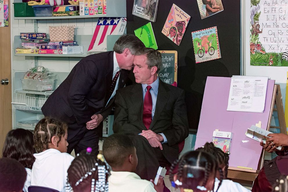 PHOTO: White House chief of staff Andrew Card whispers into the ear of President George W. Bush to give him word that planes crashed into the World Trade Center, during a visit to the Emma E. Booker Elementary School in Sarasota, Fla., Sept. 11, 2001.