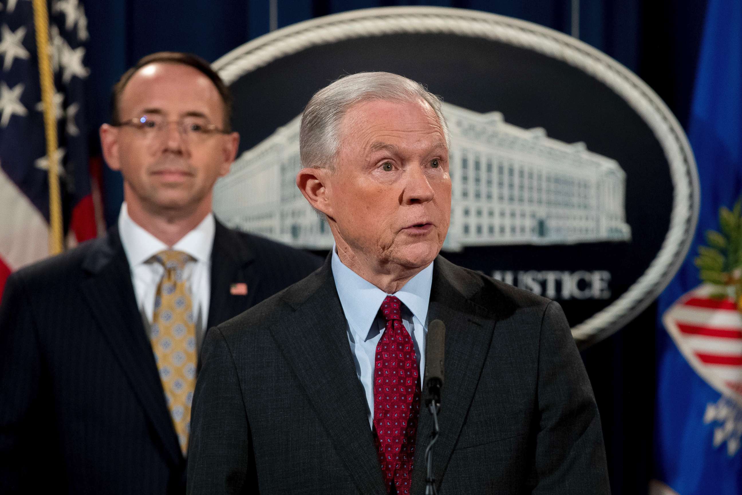 PHOTO: Attorney General Jeff Sessions accompanied by Deputy Attorney General Rod Rosenstein, left, speaks at a news conference at the Department of Justice, July 20, 2017, in Washington D.C.
