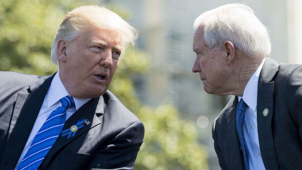 President Donald Trump speaks with Attorney General Jeff Sessions during the 36th Annual National Peace Officers Memorial Service at the Capitol, May 15, 2017.