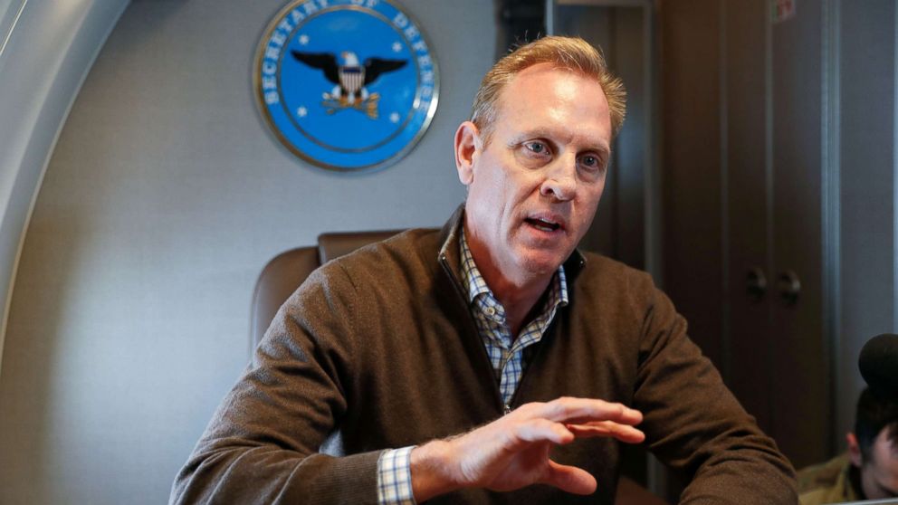  Acting Secretary of Defense Patrick Shanahan speaks to members of the media aboard a military plane prior to his arrival at Andrews Air Force Base, Md., Feb. 23, 2019.