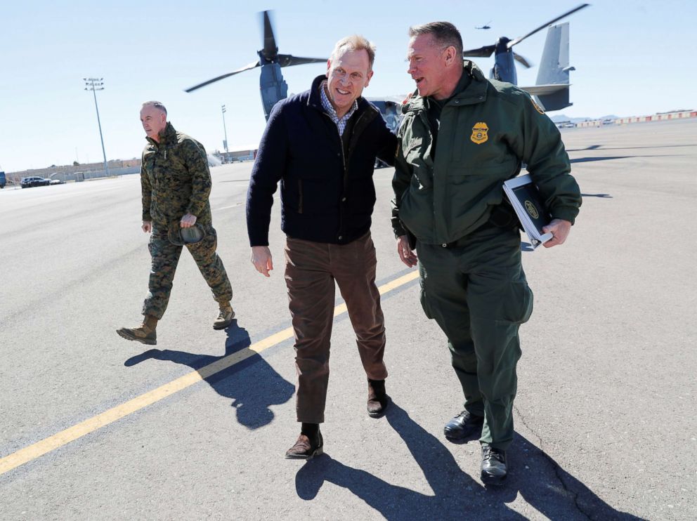 PHOTO: Acting Secretary of Defense Patrick Shanahan, center, talks with El Paso Sector Chief Aaron Hull, right, at El Paso International airport after doing a Osprey aircraft tour of the U.S.-Mexico border, Feb. 23, 2019.