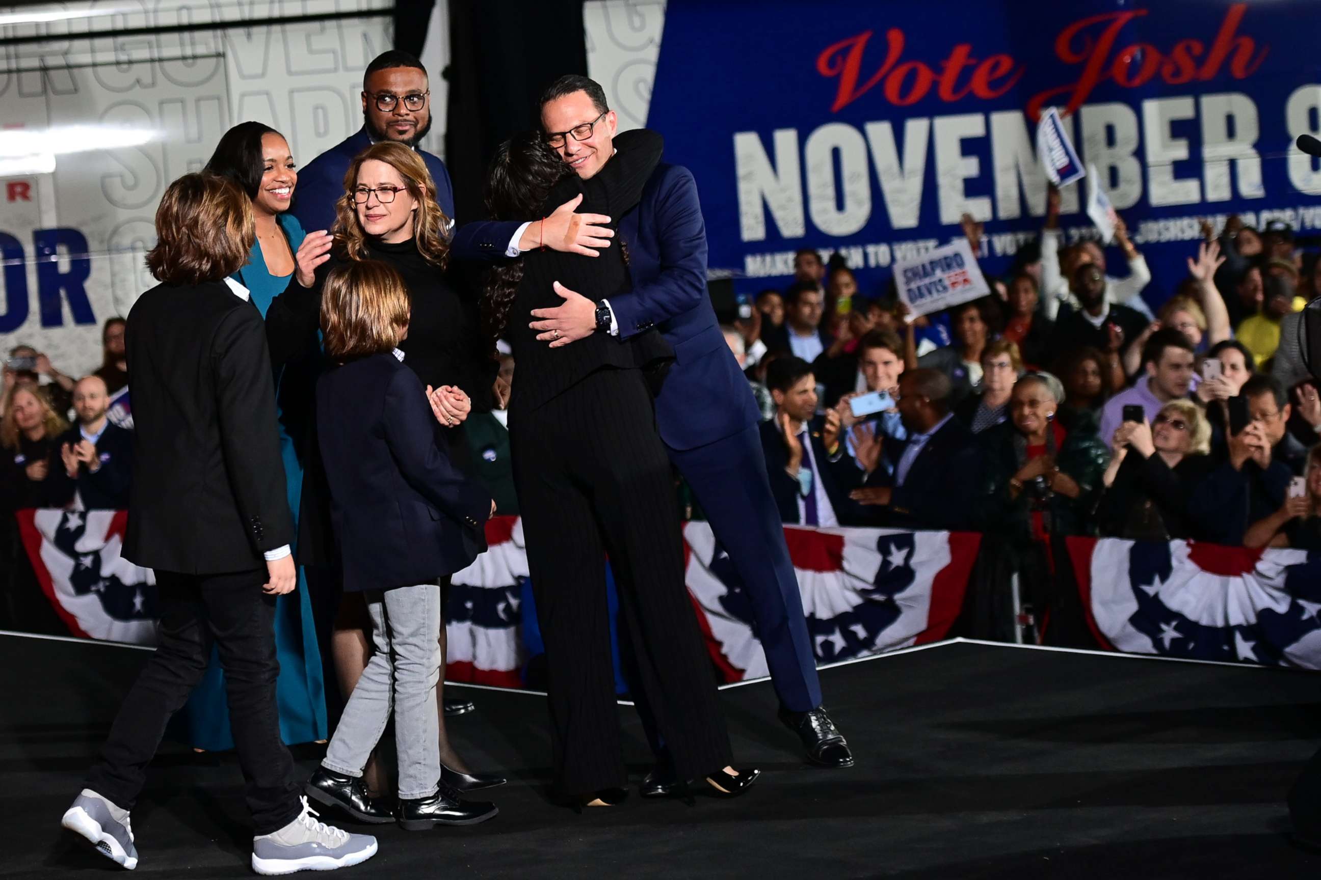 PHOTO: Democratic gubernatorial nominee Josh Shapiro embraces his family after giving a victory speech to supporters at the Greater Philadelphia Expo Center on Nov. 8, 2022 in Oaks, Penn.