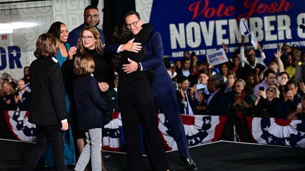 PHOTO: Democratic gubernatorial nominee Josh Shapiro embraces his family after giving a victory speech to supporters at the Greater Philadelphia Expo Center on Nov. 8, 2022 in Oaks, Penn.
