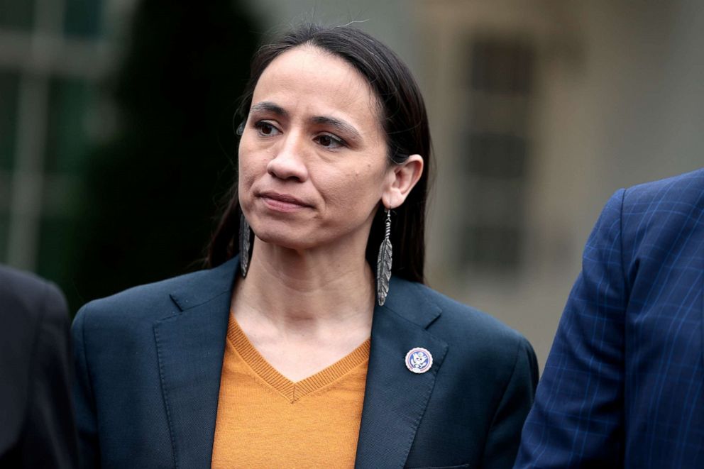 PHOTO: In this March 30, 2022, file photo, Rep. Sharice Davids listens as fellow members of the New Democrat Coalition speak to reporters outside of the West Wing of the White House in Washington, D.C.