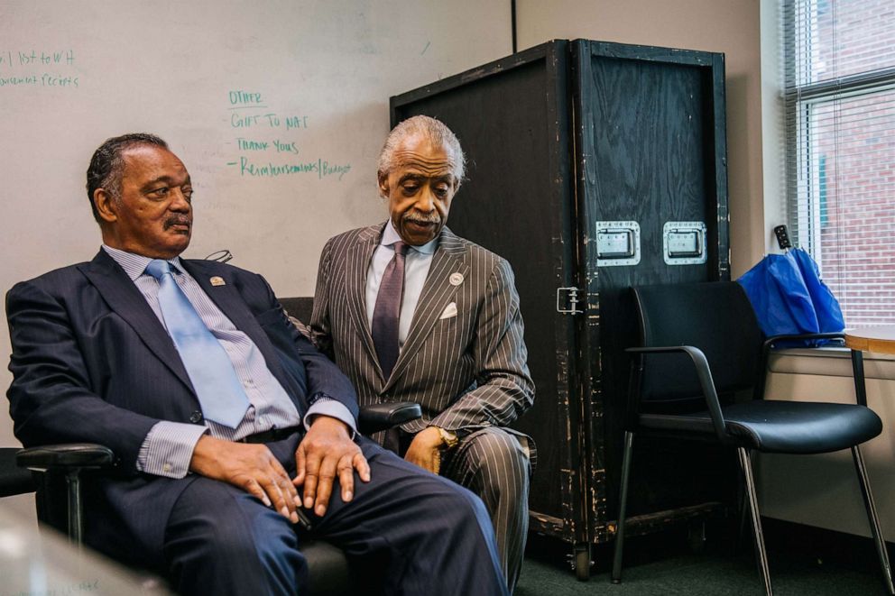 PHOTO: Civil Rights leaders Jesse Jackson and Rev. Al Sharpton spend time together ahead of a rally during commemorations of the 100th anniversary of the Tulsa Race Massacre, June 1, 2021, in Tulsa, Okla.