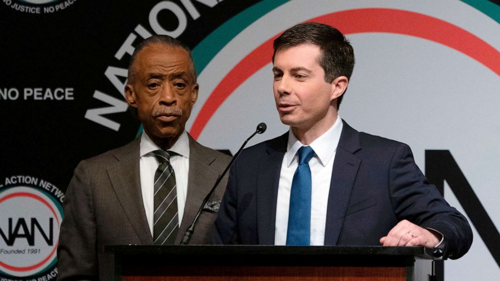 PHOTO: Democratic Presidential candidate Pete Buttigieg, with the Reverend Al Sharpton, speaks during a gathering of the National Action Network, April 4, 2019, in N.Y.