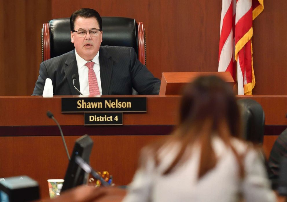 PHOTO: Orange County Supervisor Shawn Nelson responds to a speaker during the public comment section of the Orange County Board of Supervisors' meeting in Santa Ana, Calif. on Mar 27, 2018.