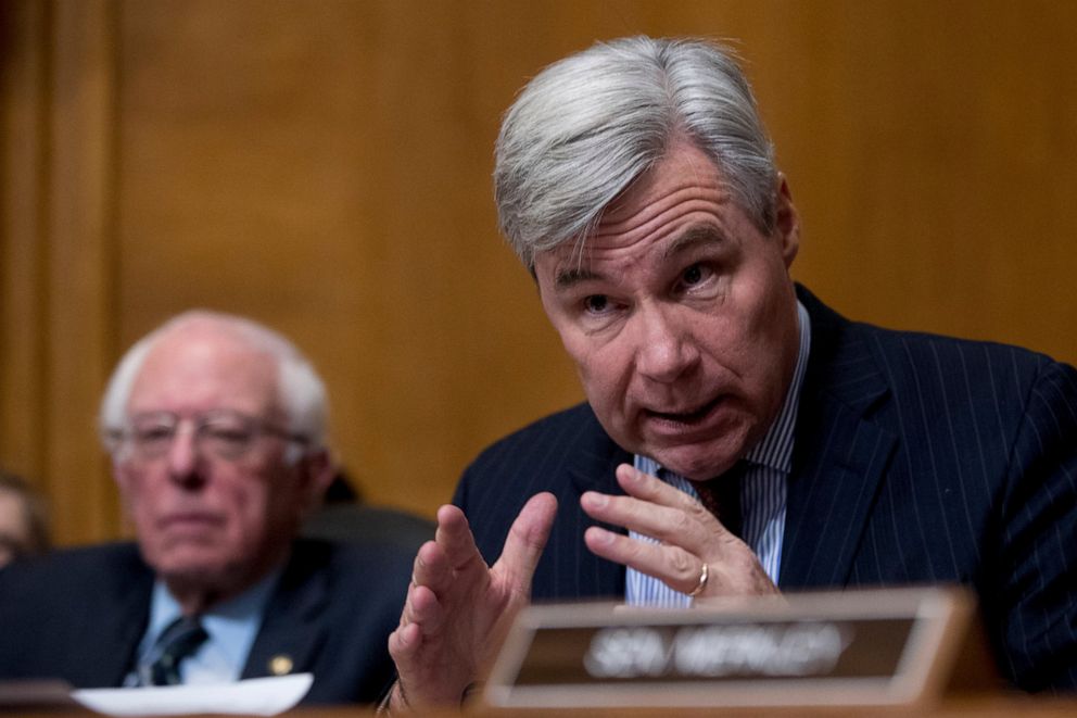 PHOTO: Sen. Sheldon Whitehouse, D-R.I., right, questions Andrew Wheeler as he testifies at a Senate Environment and Public Works Committee hearing to be the administrator of the Environmental Protection Agency, in Washington, Wednesday, Jan. 16, 2019.