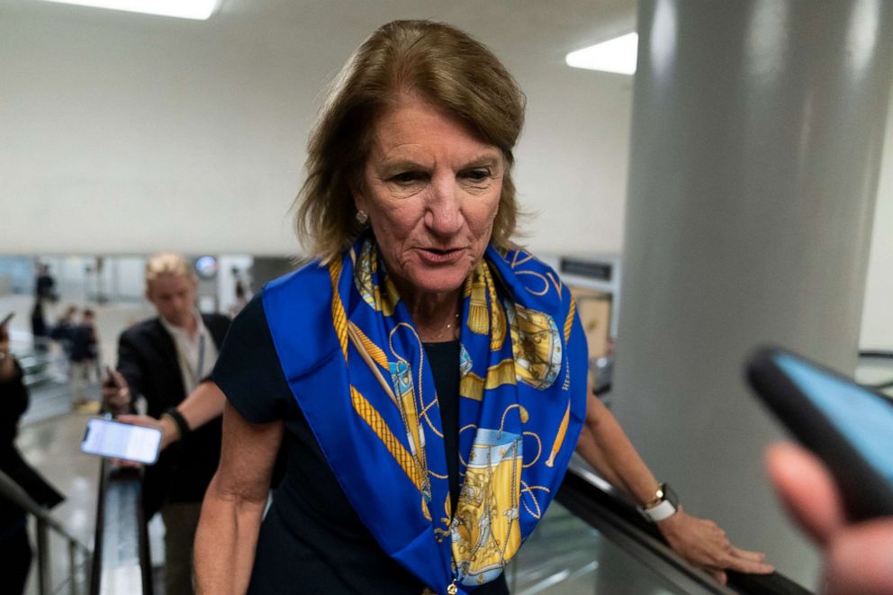 Sen. Shelley Moore Capito, R-W.Va., talks with reporters as she walks to a vote on Capitol Hill on June 8, 2021, in Washington. 