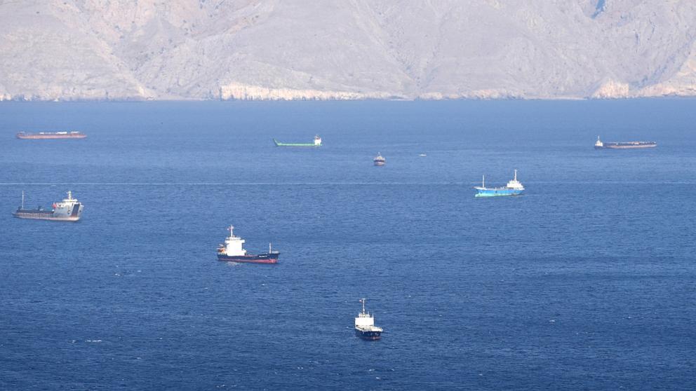 PHOTO: SShips and tankers in the Strait of Hormuz off the coast of Musandam, Oman, April 18, 2026. 