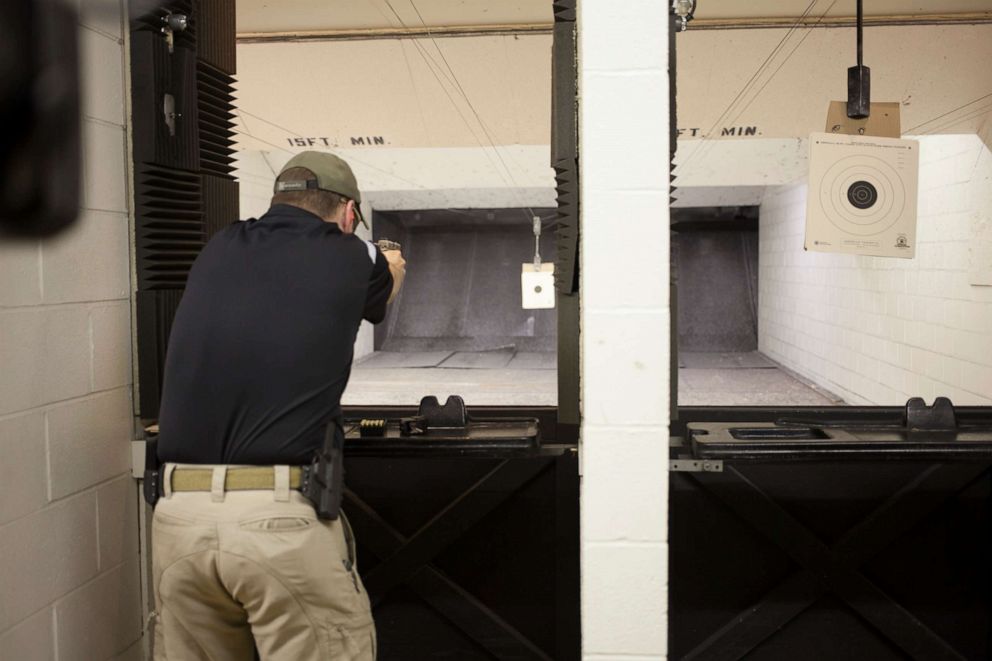 PHOTO: A customer fires at a shooting range at Highsmith Guns in Greenfield, Ind., April 25, 2019.
