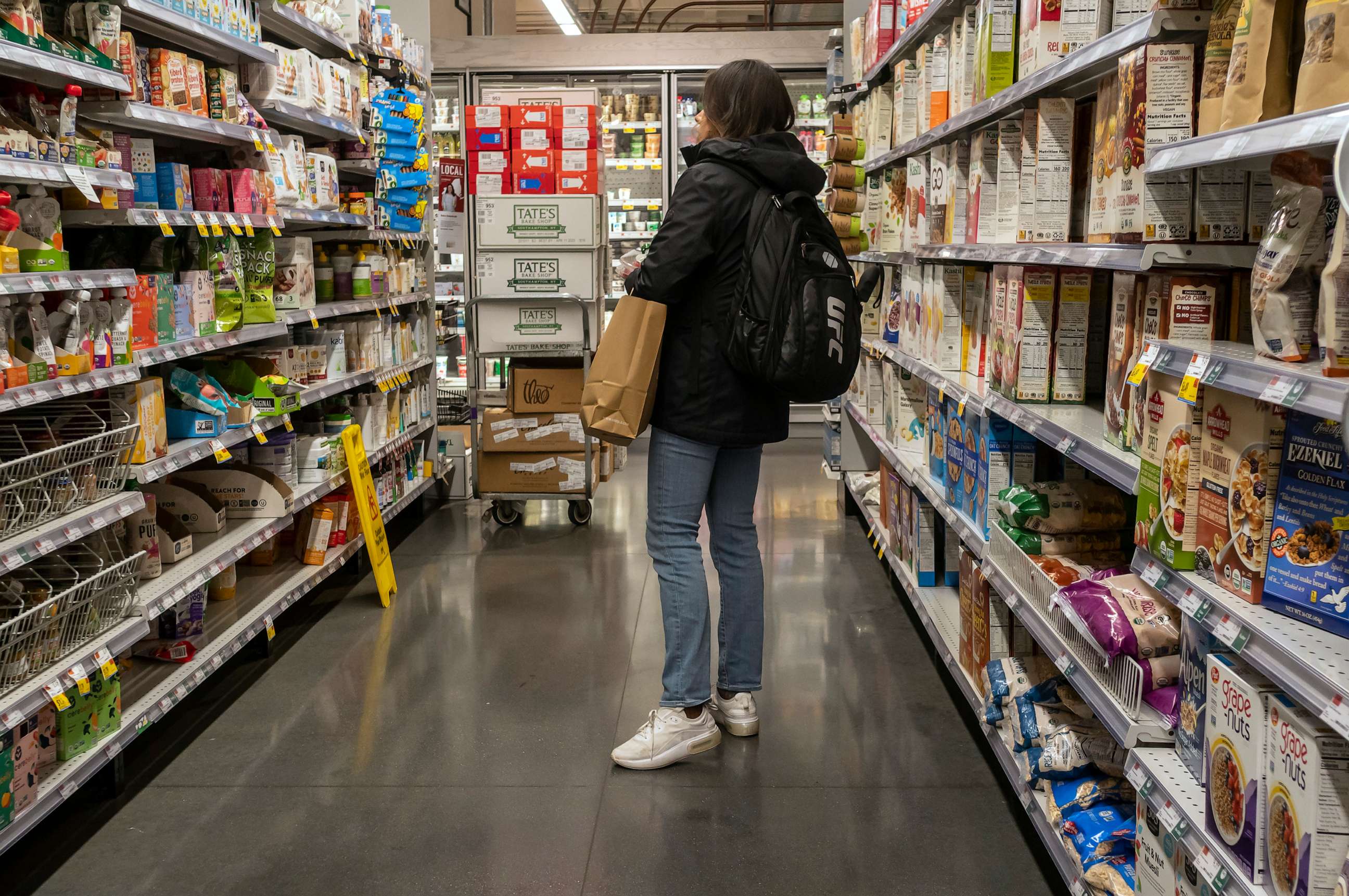 PHOTO: A customer shops in supermarket in New York, Jan. 31, 2023.