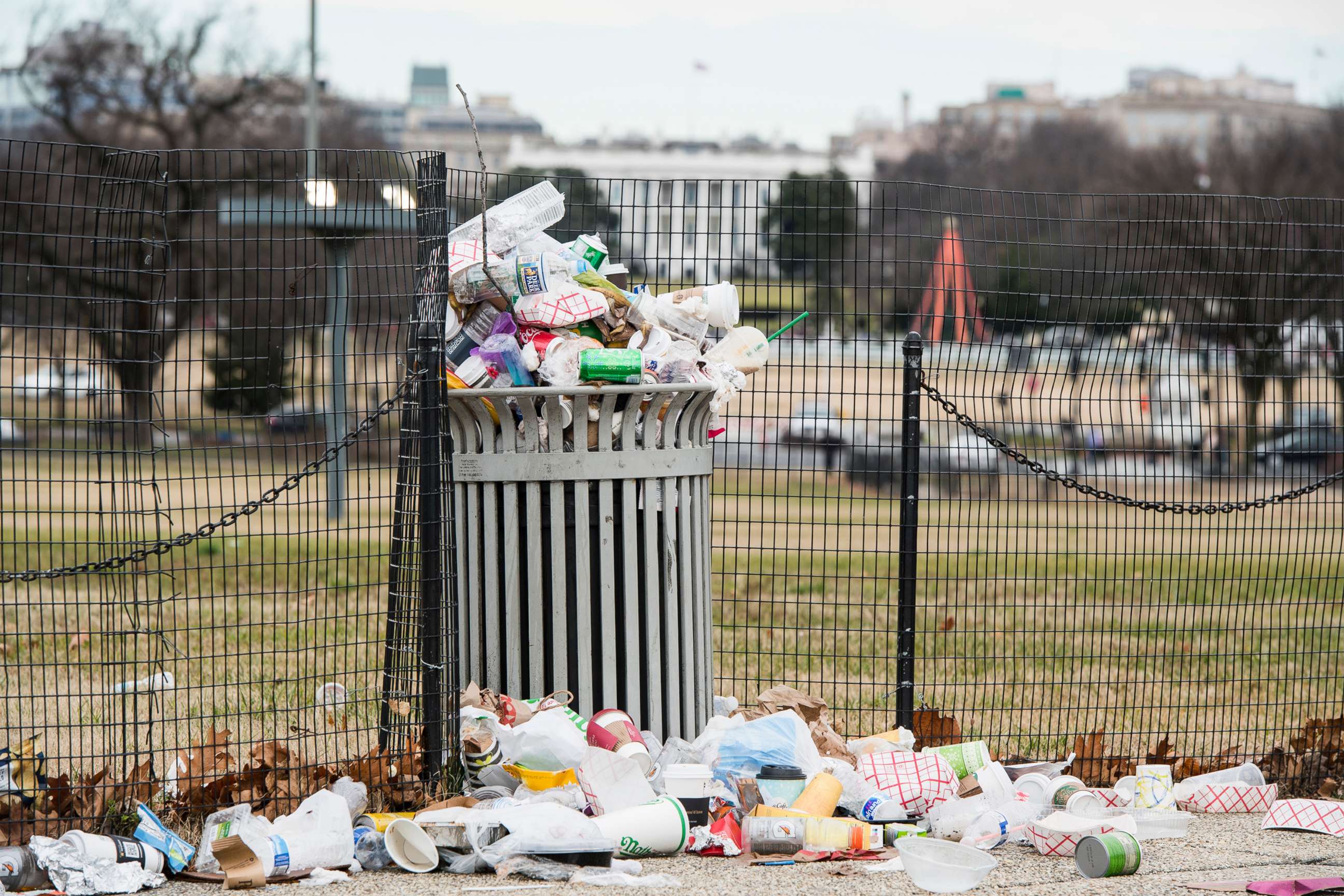 PHOTO: Garbage overflows a trash can on the National Mall across from the White House, Jan. 1, 2019.