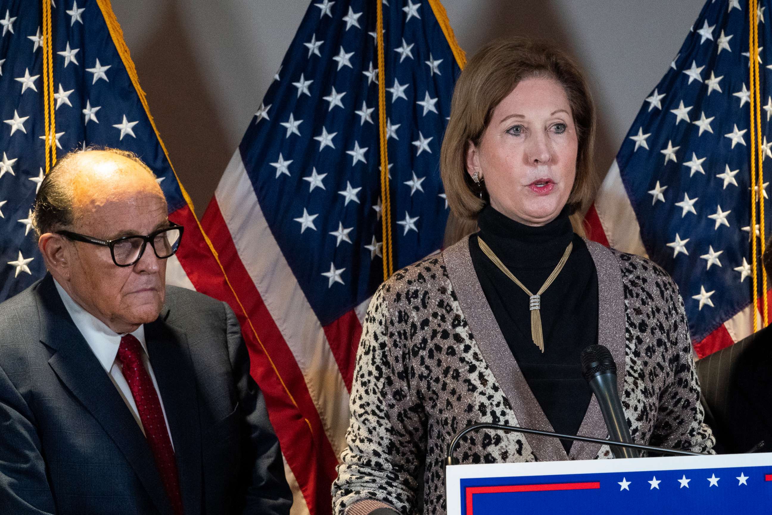 PHOTO: Sidney Powell, right, speaks next to former Mayor of New York Rudy Giuliani, as members of President Donald Trump's legal team, during a news conference at the Republican National Committee headquarters, Thursday Nov. 19.