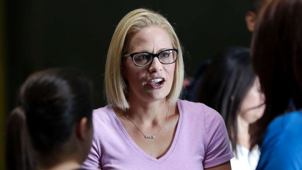 PHOTO: U.S. Senatorial candidate U.S. Rep. Kyrsten Sinema, D-Ariz., speaks with volunteers in Phoenix, Aug. 21, 2018.