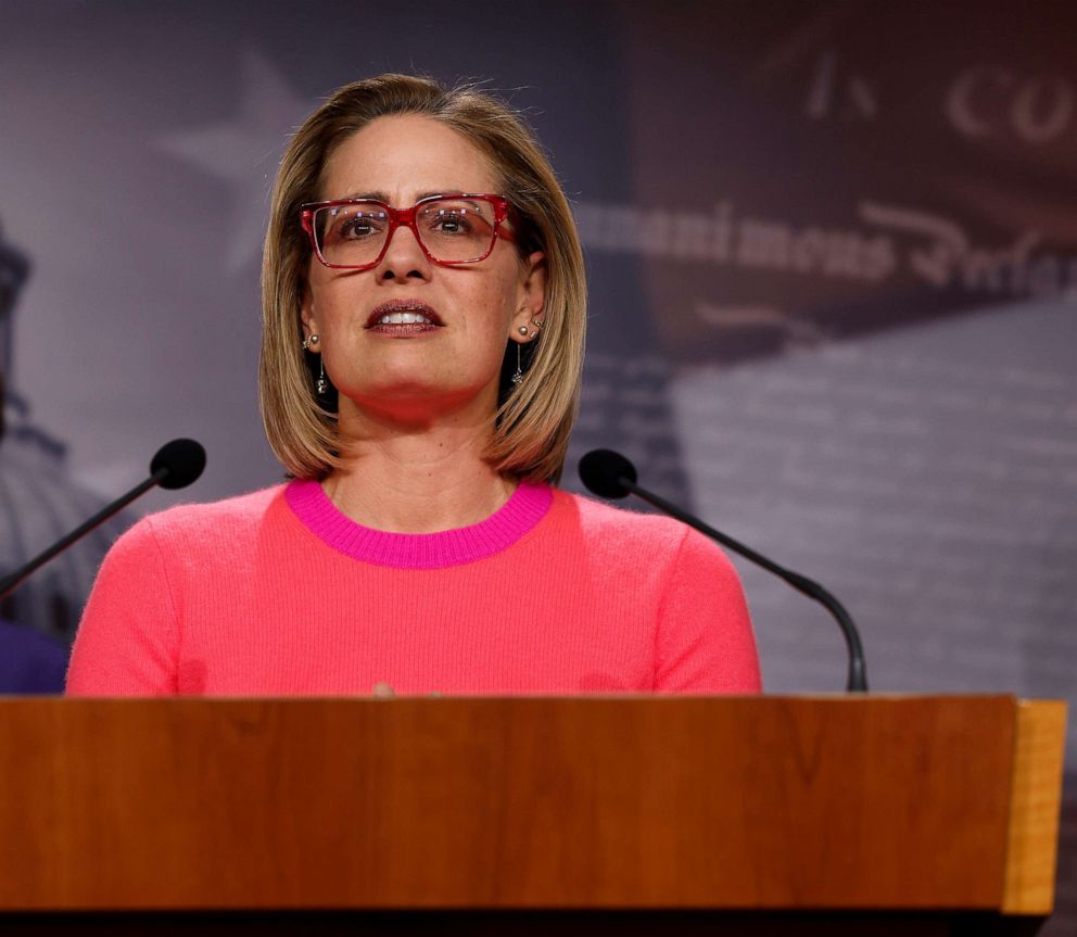 PHOTO: Sen. Kyrtsen Sinema speaks at a news conference after the Senate passed the Respect for Marriage Act at the Capitol Building, Nov. 29, 2022, in Washington, D.C.