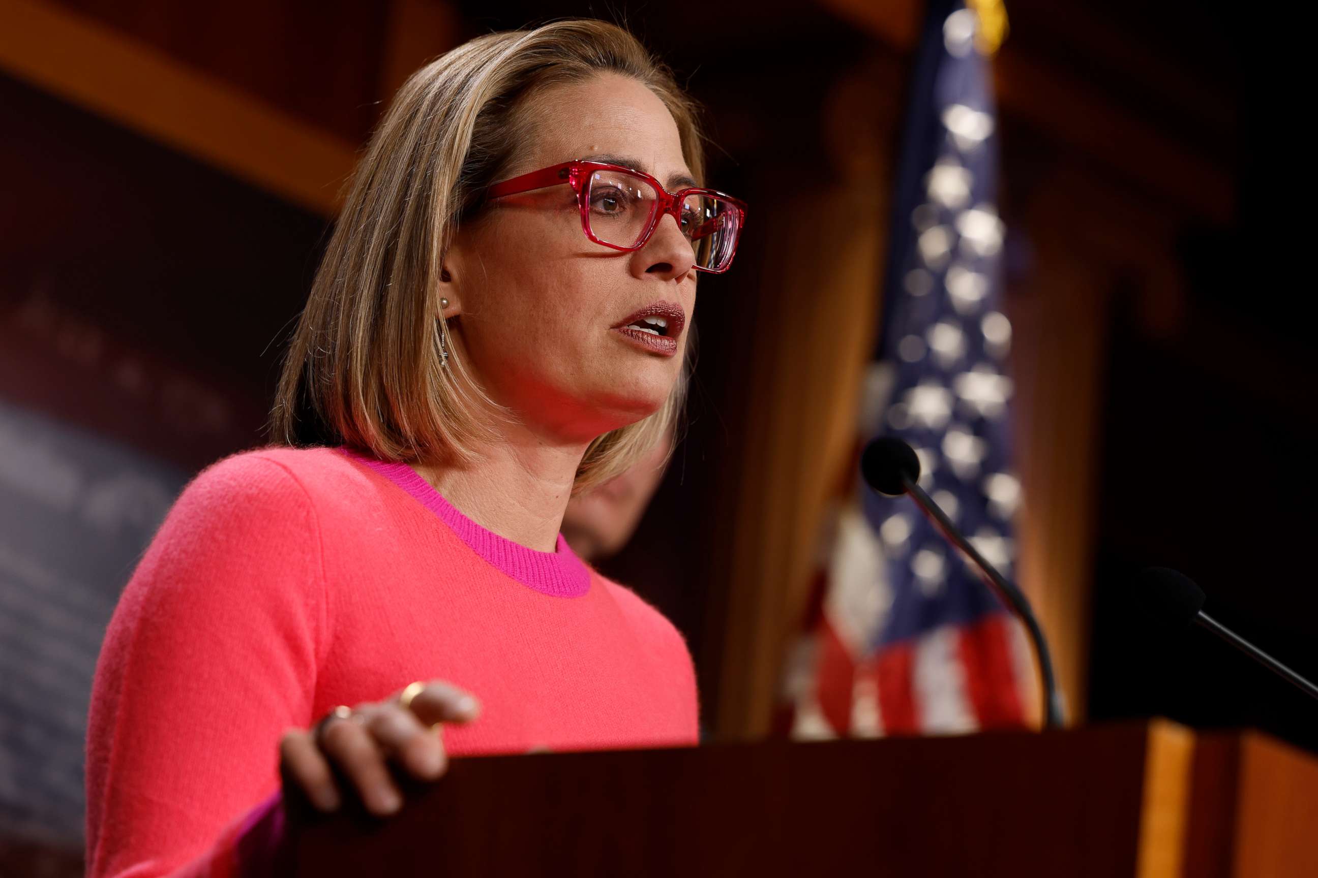 PHOTO: WASHINGTON, DC - NOVEMBER 29:  U.S. Sen. Kyrtsen Sinema (D-AZ) speaks at a news conference after the Senate passed the Marriage Equality Act at the Capitol Building on November 29, 2022 in Washington, DC. 