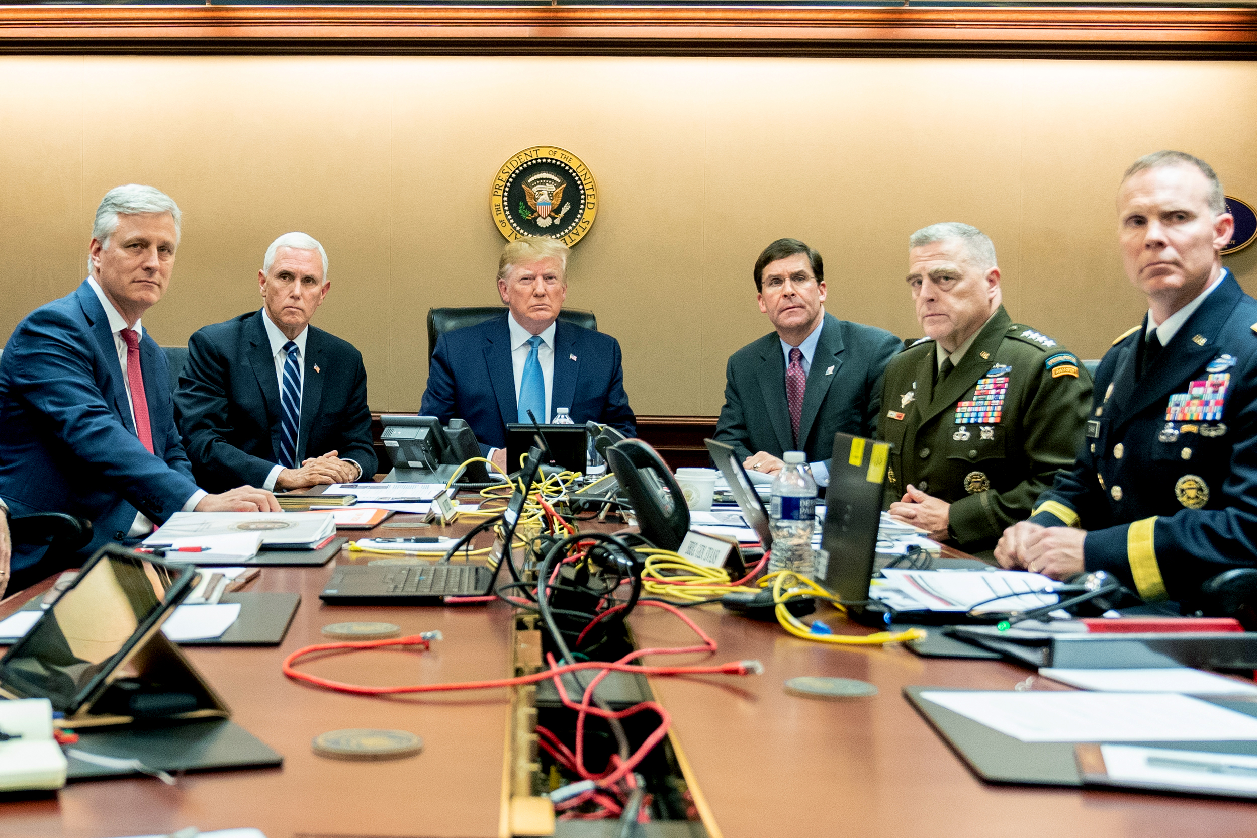 PHOTO: President Donald Trump and government officials monitor developments as special operations forces close in on ISIS leader Abu Bakr al-Baghdadi's compound in Syria in the situation room at the White House, Oct. 26, 2019. 
