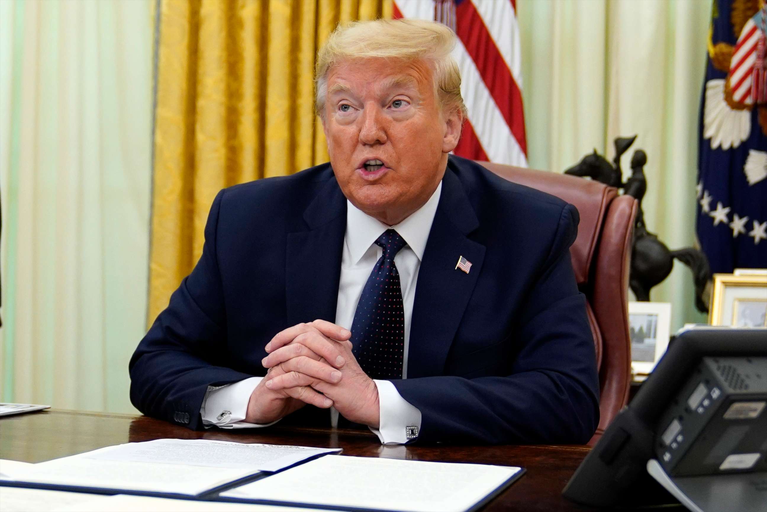 PHOTO: President Donald Trump speaks before signing an executive order aimed at curbing protections for social media giants, in the Oval Office of the White House, May 28, 2020, in Washington.