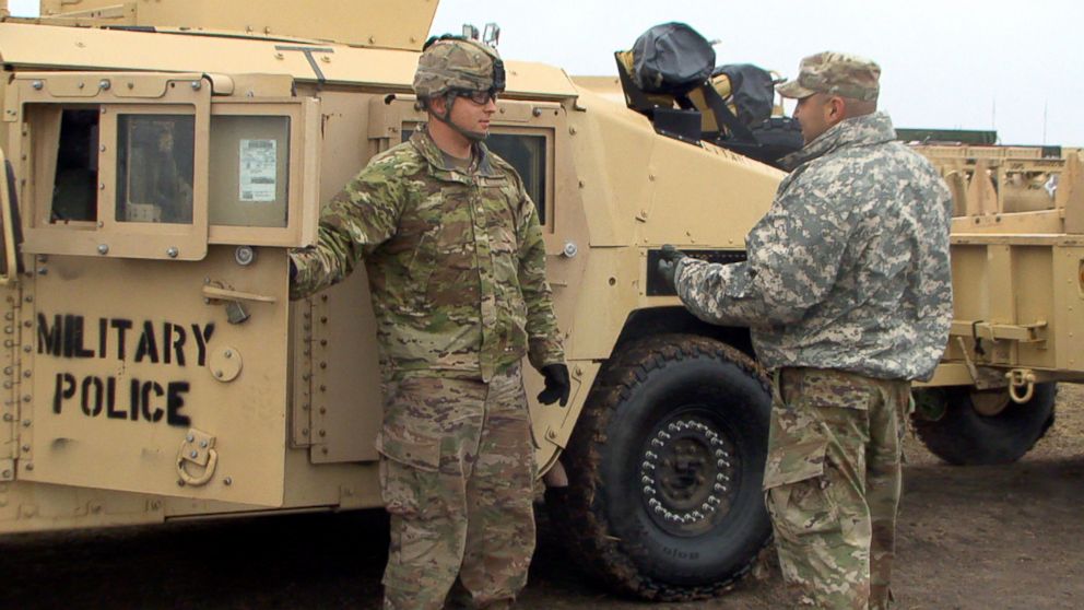 PHOTO: A U.S. Army soldier prepares to drive off base.