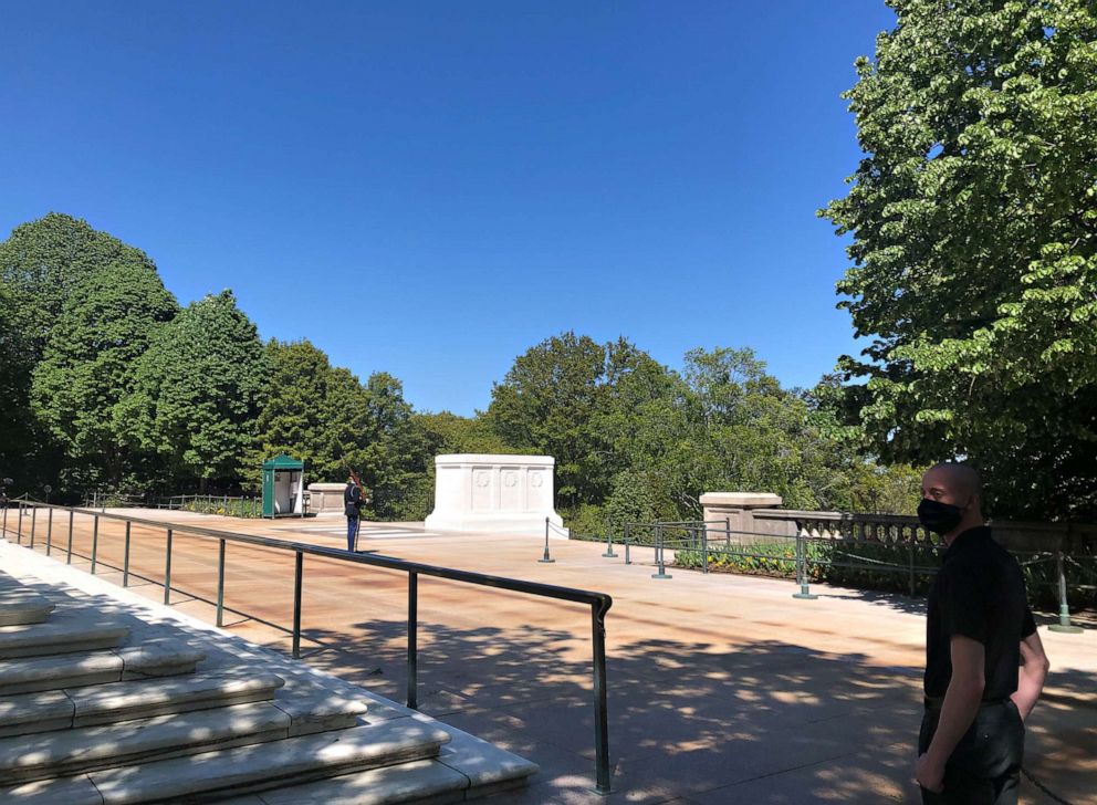 PHOTO: A sentinel stands watch at the Tomb of the Unknown Soldier at Arlington National Cemetery, April 22, 2020, during the coronavirus pandemic.