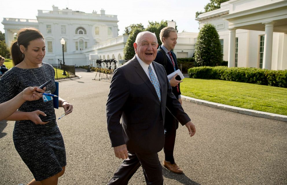 PHOTO: Agriculture Secretary Sonny Perdue walks past the West Wing on the North Lawn of the White House in Washington, May 23, 2019.