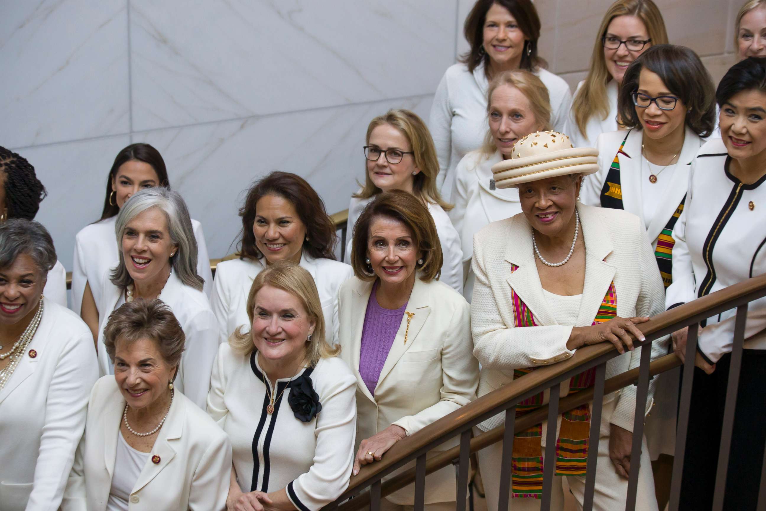 PHOTO: House Speaker Nancy Pelosi is joined by other women wearing white, as they pose for a group photo before the State of the Union address by President Donald Trump, on Capitol Hill, Feb. 5, 2019, in Washington.