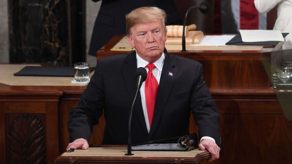 PHOTO: President Donald Trump, flanked by speaker of the U.S. House of Representatives Nancy Pelosi and Vice President Mike Pence, takes the podium to deliver the State of the Union address in Washington, Feb. 5, 2019.
