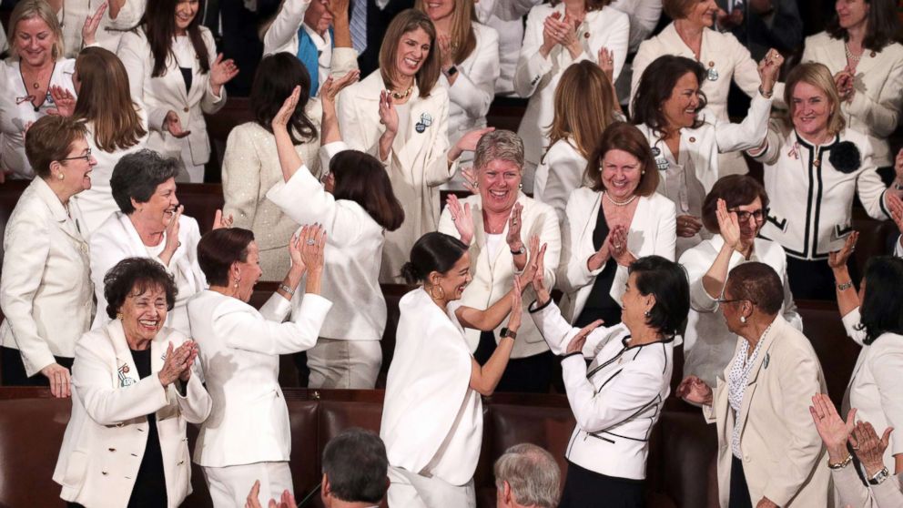 women dressed in white