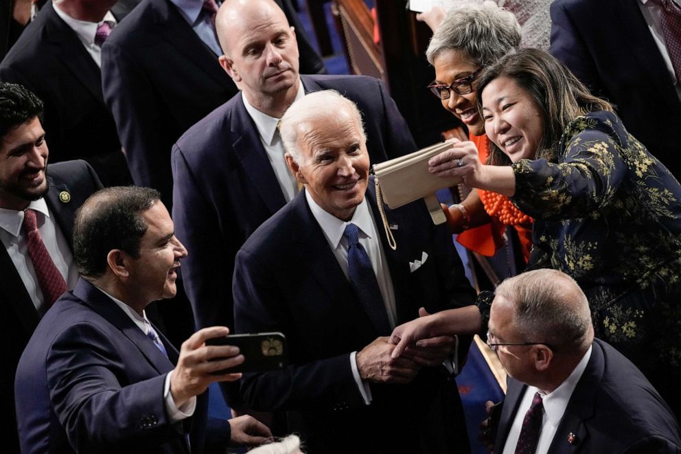 PHOTO: President Joe Biden takes pictures with members of Congress after his State of the Union address Feb. 7, 2023 in Washington.