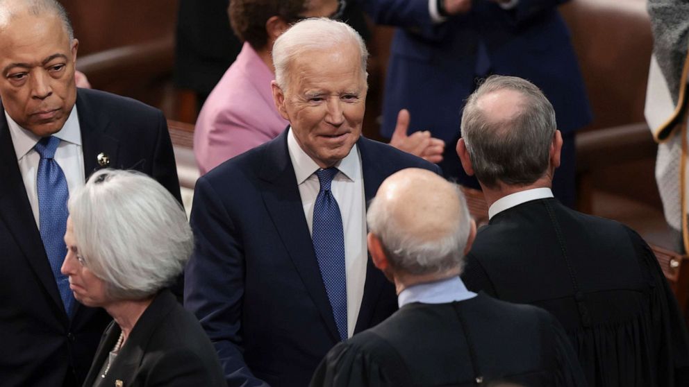 PHOTO: President Joe Biden arrives and greets lawmakers before delivering his State of the Union address to a joint session of Congress at the Capitol, March 1, 2022, in Washington.