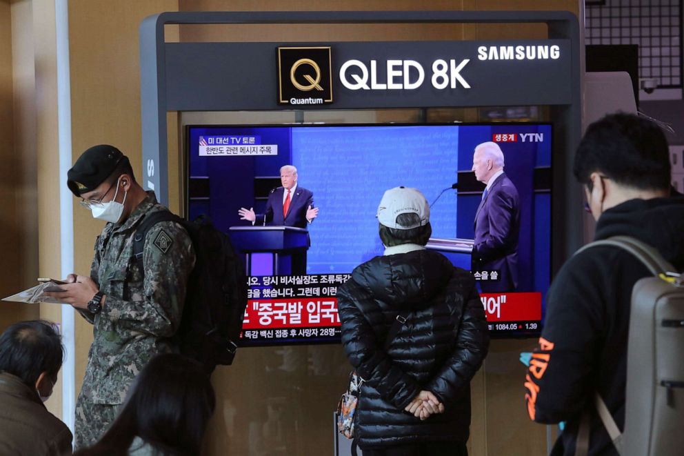 PHOTO: A TV screen shows a live broadcast of U.S. President Donald Trump and Democratic presidential candidate former Vice President Joe Biden during the final presidential debate, at the Seoul Railway Station in Seoul, Oct. 23, 2020.