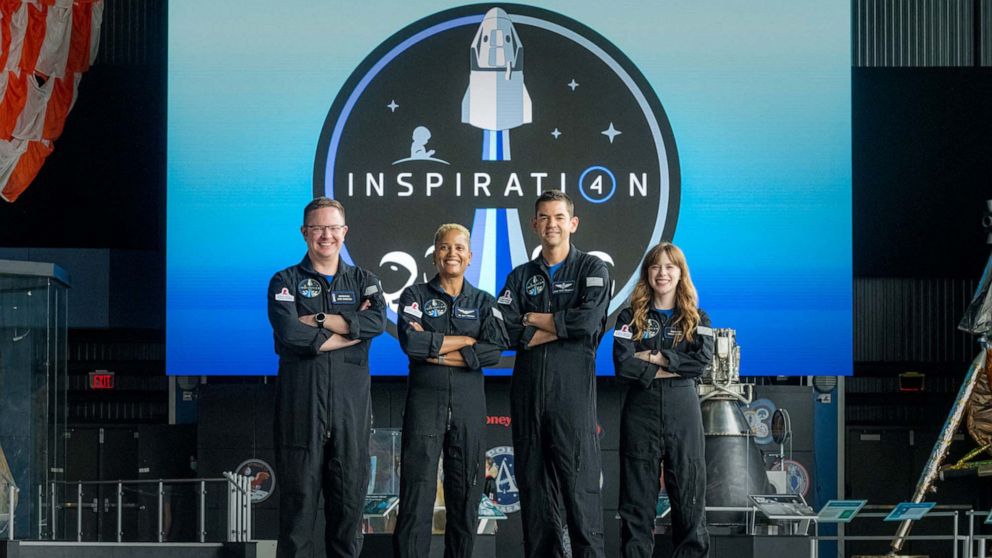 PHOTO: The Inspiration4 crew,Chris Sembroski, Sian Proctor, Jared Isaacman and Hayley Arceneaux pose for a photo, July 1, 2021.