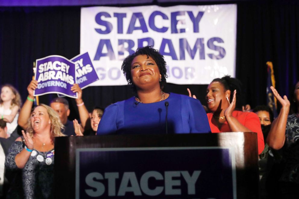 PHOTO: Georgia Democratic gubernatorial candidate Stacey Abrams smiles before speaking to supporters during an election-night watch party, May 22, 2018, in Atlanta.