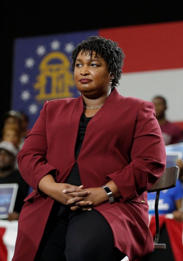 PHOTO: Georgia gubernatorial candidate Stracey Abrams watch as former President Barack Obama speaks during a campaign rally at Morehouse College Friday, Nov. 2, 2018, in Atlanta.