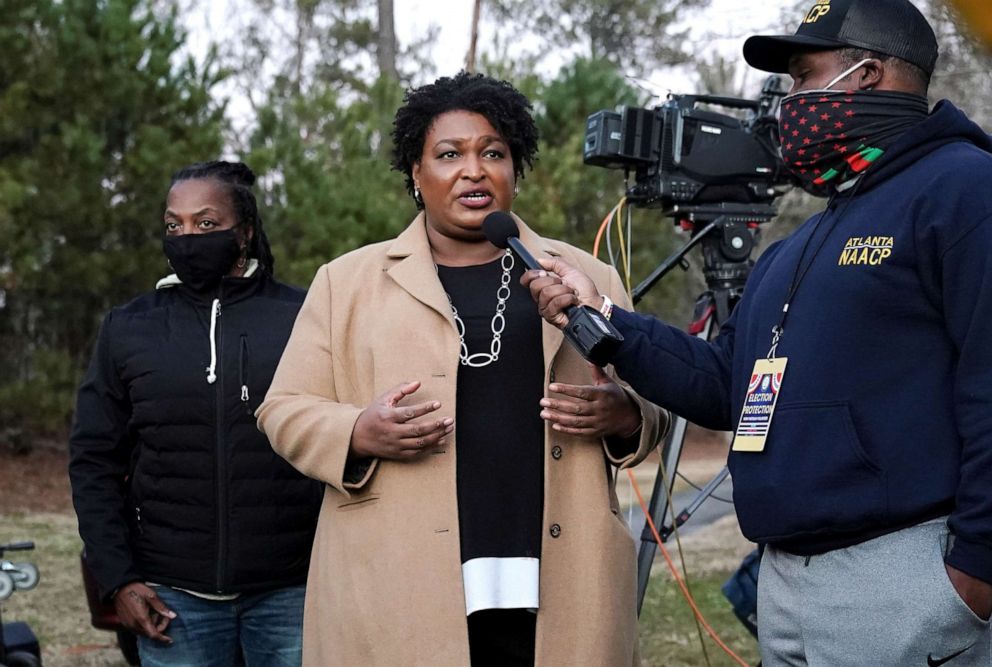 PHOTO: Stacey Abrams speaks to the media about the U.S. Senate runoff elections outside St. Paul's Episcopal Church in Atlanta, Jan. 5, 2021.