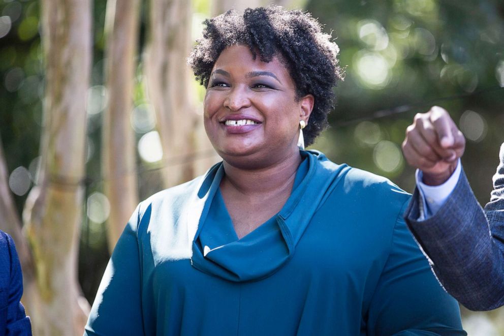 PHOTO: Former US Representative and voting rights activist Stacey Abrams is introduced before speaking at an election rally in Norfolk, Va., Oct. 17, 2021.