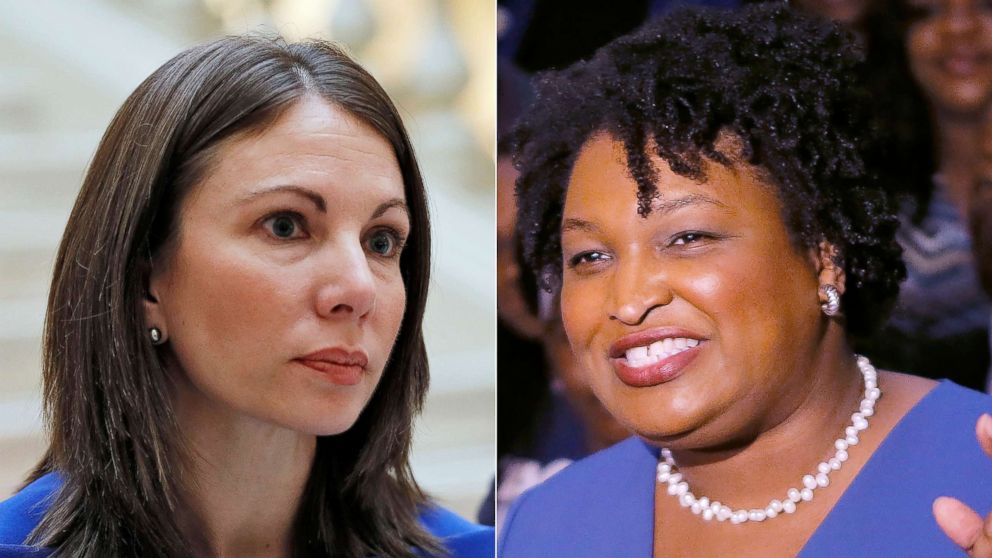 Stacey Evans answers questions after she qualified for the governors race in Atlanta, March 5, 2018.|Stacey Abrams holds a news conference to announce she has qualified to run for governor in Atlanta, March 6, 2018.