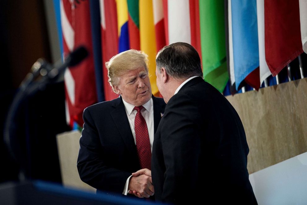 PHOTO: President Donald Trump is greeted by Secretary of State Mike Pompeo before speaking to the Ministers of the Global Coalition to Defeat ISIS at the Department of State, Feb. 6, 2019, in Washington, D.