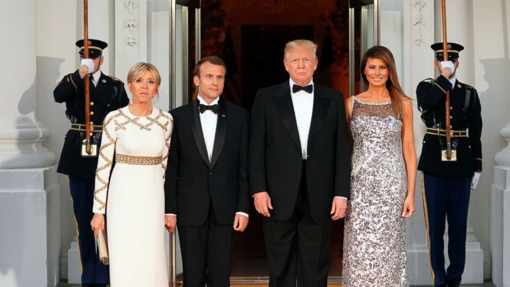 PHOTO: President Donald Trump and first lady Melania Trump pose for a photo after greeting French President Emmanuel Macron and his wife Brigitte Macron as they arrive for a State Dinner at the White House, April 24, 2018. 