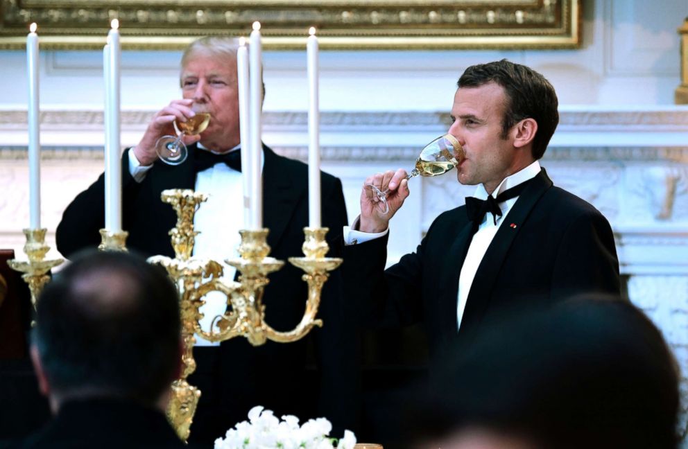 PHOTO: Donald Trump and French President Emmanuel Macron toast during a state dinner at the White House, April 24, 2018. 