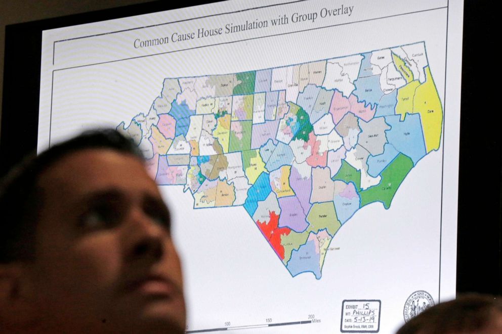 PHOTO: In this July 15, 2019, file photo, a state districts map is shown as a three-judge panel of the Wake County Superior Court presides over the trial of Common Cause, et al. v. Lewis, et al, in Raleigh, N.C.