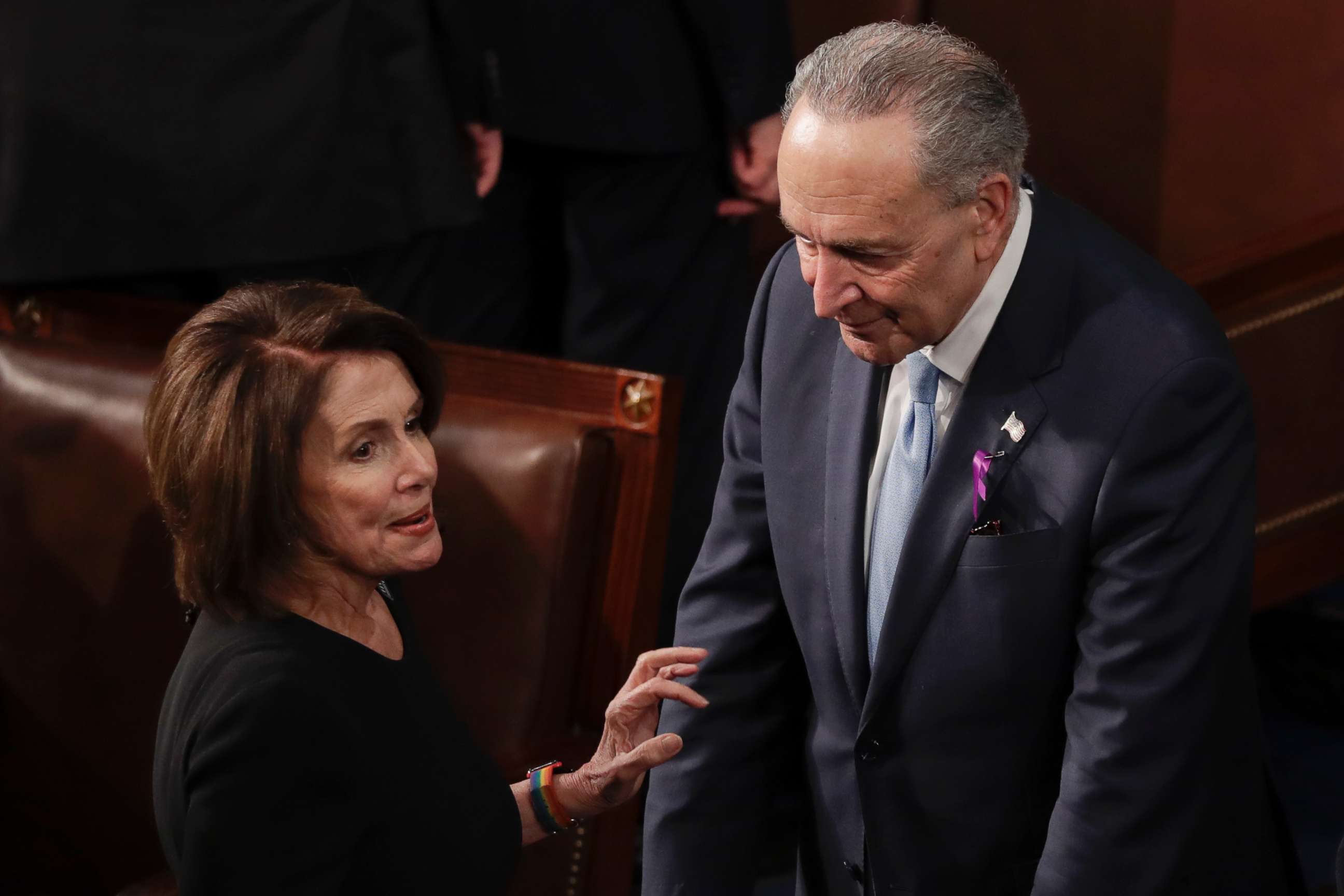 PHOTO: House Minority Leader Nancy Pelosi talks with Senate Minority Leader Chuck Schumer before the State of the Union address to a joint session of Congress on Capitol Hill in Washington, Jan. 30, 2018. 