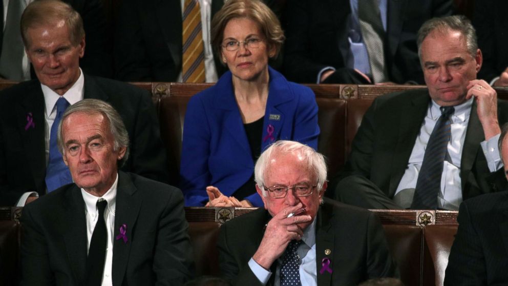PHOTO: Senator Bernie Sanders, center, watches President Trump during the State of the Union address, January 30, 2018 in Washington, DC. 